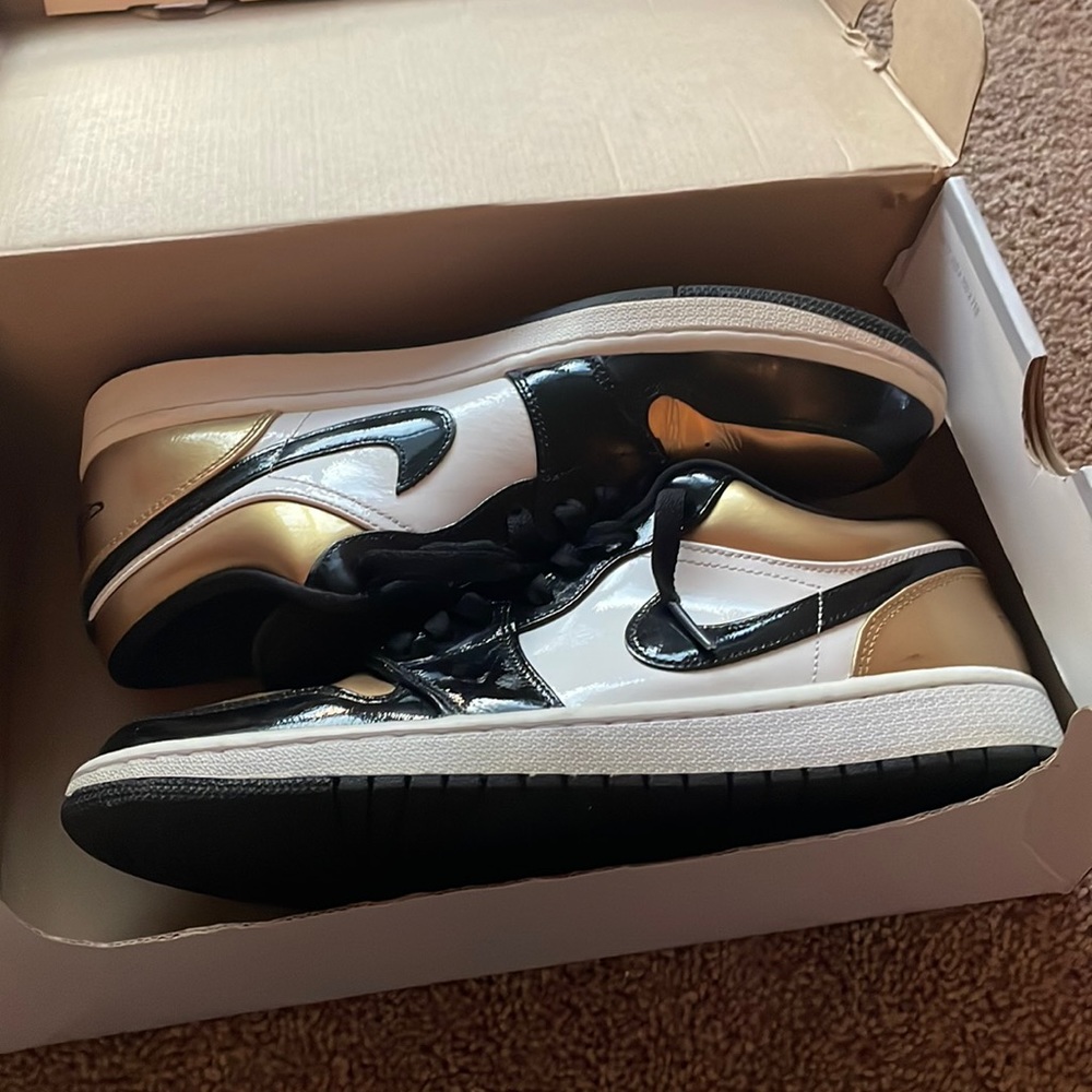 White, black and gold Jordan ones. Size 9.5.
